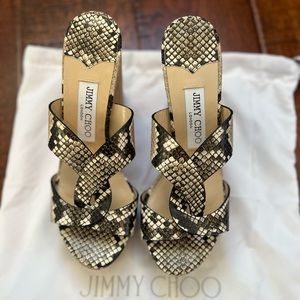 Brand New, never worn Jimmy Choo wedges. Size 38. Snake print.